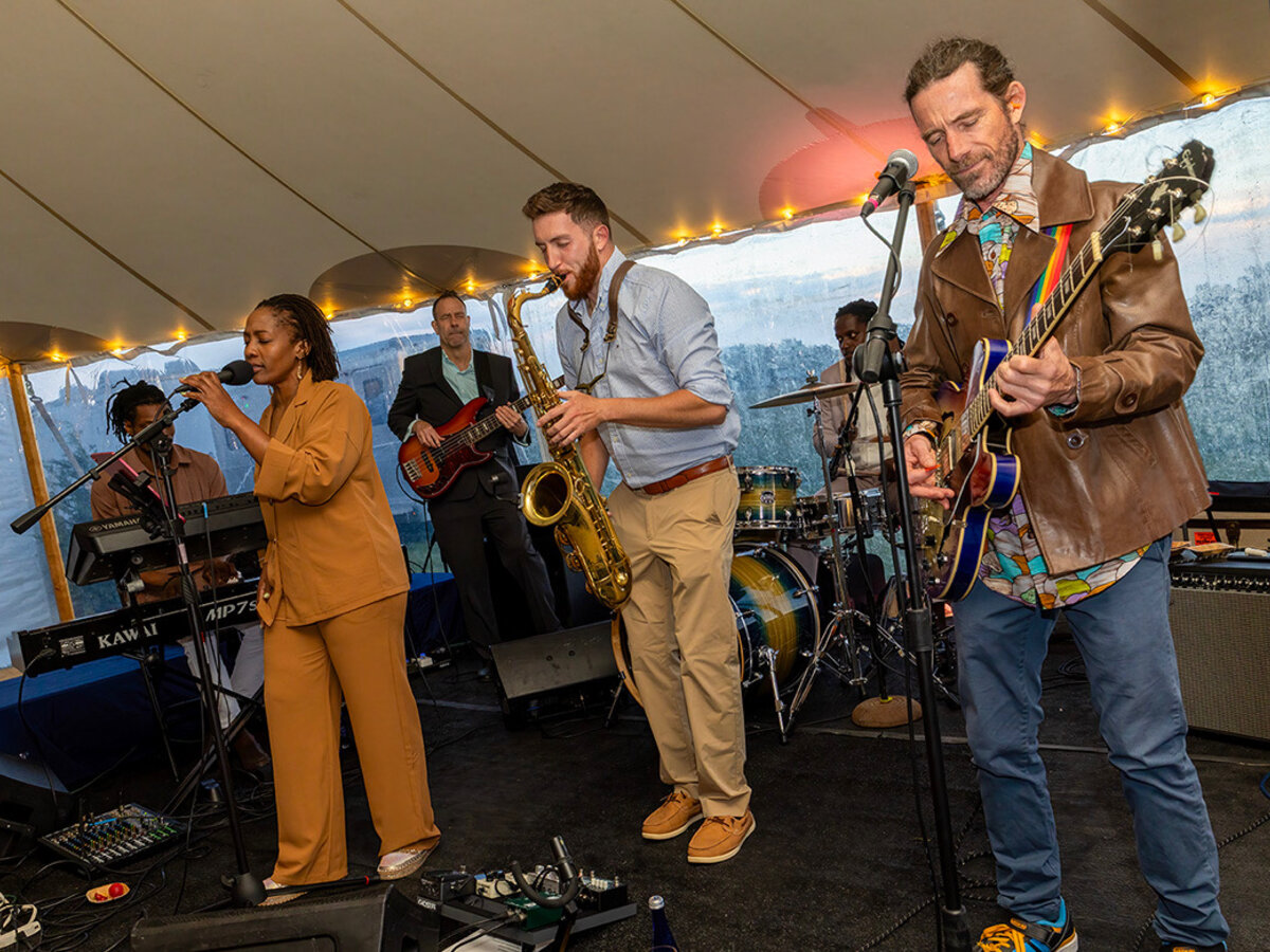 Dawson Bertrand performing with an ensemble at a corporate event venue